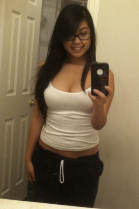 Busty non nude Asian chick with glasses selfshot